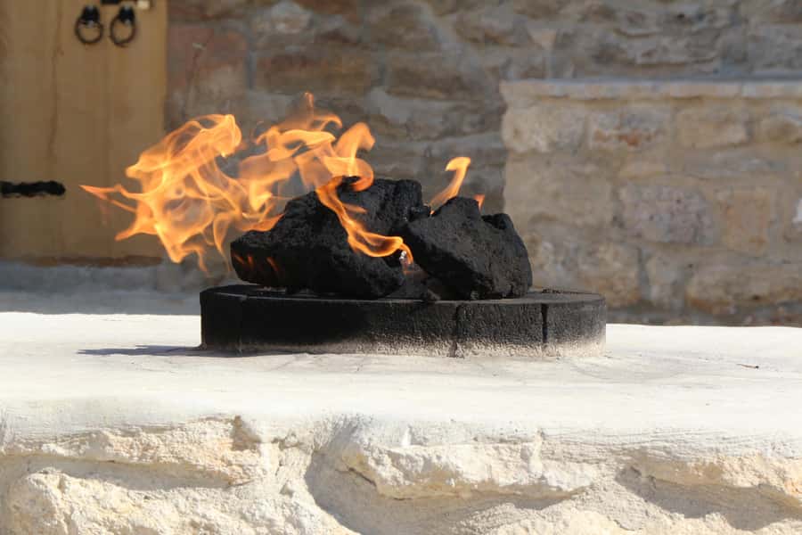 Baku: Burning Mountain & Zorastrian Temple Private Tour - Yanar Dag, where the hillside burns
