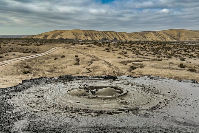 Baku: Gobustan, Mud Volcano, Fire Temple & Burning Mountain - Yanardag and the fire coming from the ground