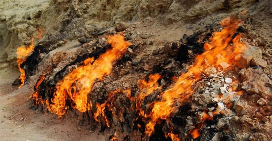 Baku:Gobustan Mud Volcanoes Temple & Entry tickets included - Yanar Dag, where the hillside burns