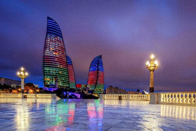 Baku Night City Tour Discover the Magic of Illuminated Landmarks - Heydar Mosque under evening lighting