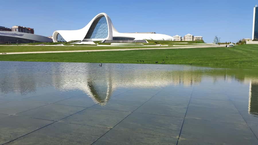 Baku: Night Panoramic Group Tour with Flame Towers 1 - Walking Baku Boulevard after sunset