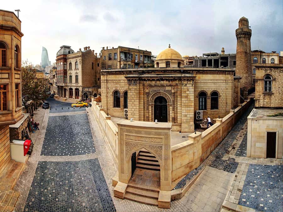 Baku: Old City Guided Walking Tour - Miniature books in an unexpectedly small museum