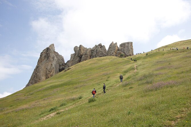 Beshbarmag mountain with sea view and Candy Mountains <em> Day Tour – Key points at a glance’ /></p>
<ul>
<li><strong>Three unusual natural stops:</strong> See Masazir’s pink water, Candy Cane Mountain’s colored soil, and Beshbarmag’s five-fingered rock.</li>
<li><strong>Beshbarmag has spiritual meaning:</strong> The mountain remains a place where local people come to pray.</li>
<li><strong>A small group matters:</strong> The tour accepts no more than 12 people, making questions and guide interaction easier.</li>
<li><strong>The timing is tight but useful:</strong> You cover out-of-town scenery and two Baku sights in about eight hours.</li>
<li><strong>The Cultural Center costs extra:</strong> Admission is not included, so budget separately if you want to enter.</li>
<li><strong>Weather affects the day:</strong> Sun brings out Candy Cane Mountain’s colors, and poor weather can lead to a new date or refund.</li>
</ul>
<h2>Why this Baku day trip works</h2>
<p><img width="669" height="446" decoding="async" src=