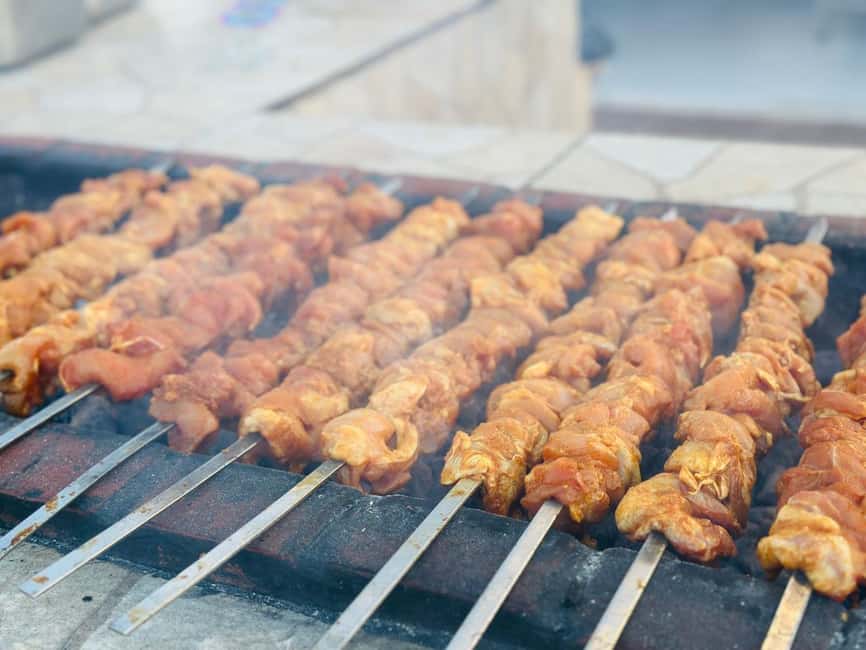 Dubai: Desert Safari, Camel Ride, Quad Bike & BBQ Dinner - Belly dancing, Tanoura, fire, and folk performances