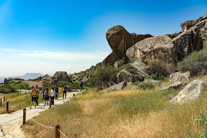 Gobustan & Mud, Fire Temple, Burning Mountain (Group & Private) - Gobustan rock art rewards a guide who tells the story well